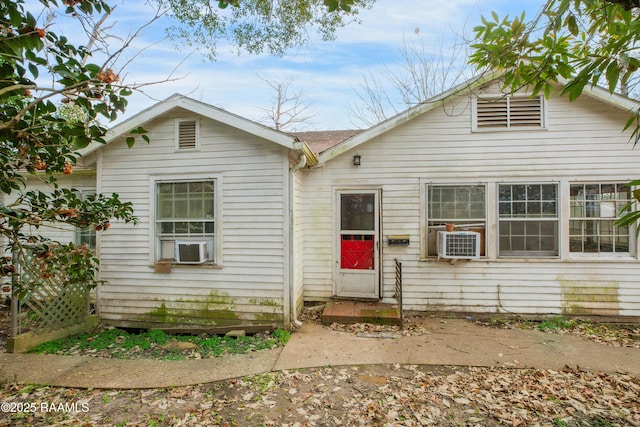 view of front of property with cooling unit