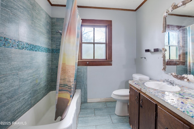 full bathroom featuring crown molding, a healthy amount of sunlight, toilet, and shower / bath combo with shower curtain