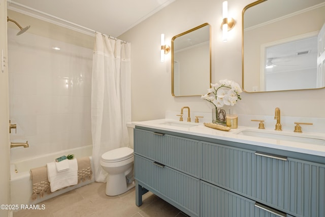 full bathroom with shower / tub combo with curtain, tile patterned floors, toilet, crown molding, and vanity