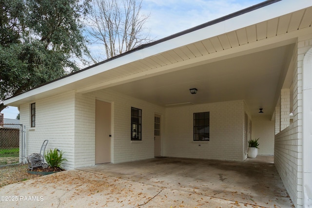 entrance to property featuring a carport