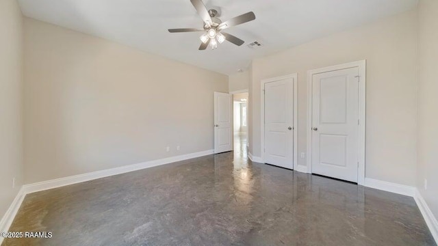 unfurnished bedroom featuring ceiling fan