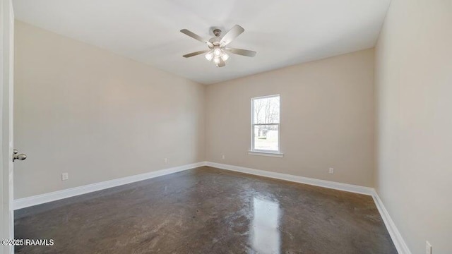 spare room with ceiling fan