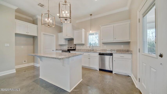 kitchen featuring sink, decorative light fixtures, a center island, appliances with stainless steel finishes, and white cabinets