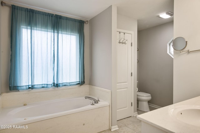 full bathroom featuring vanity, tile patterned flooring, a garden tub, and toilet