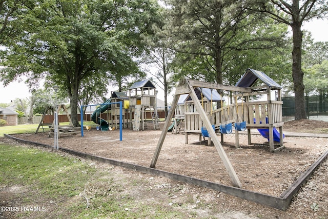 community jungle gym with fence