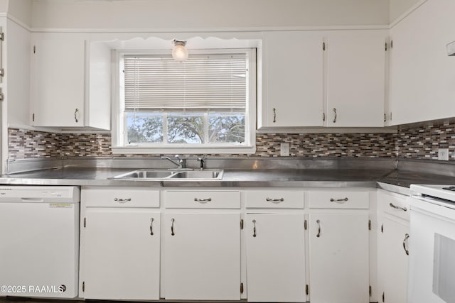 kitchen featuring white cabinetry, sink, white appliances, and tasteful backsplash