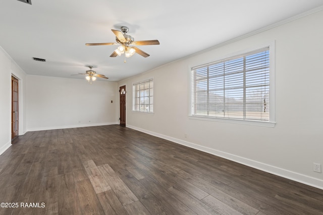 unfurnished room featuring crown molding, ceiling fan, and dark hardwood / wood-style flooring