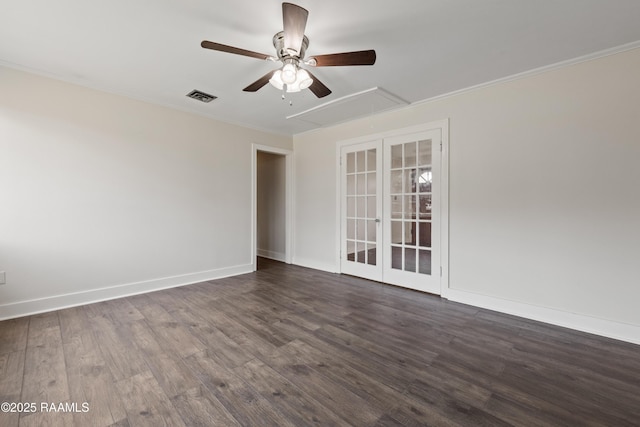 empty room with crown molding, ceiling fan, and dark hardwood / wood-style flooring