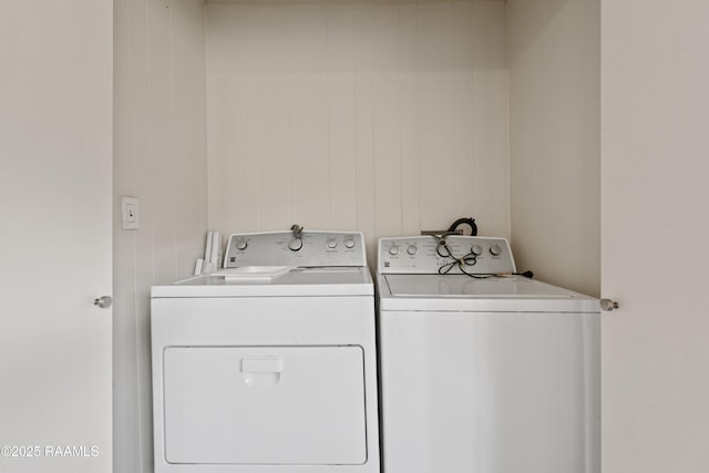 laundry area featuring washing machine and dryer