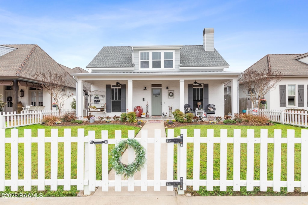 bungalow-style home with a front lawn and a porch