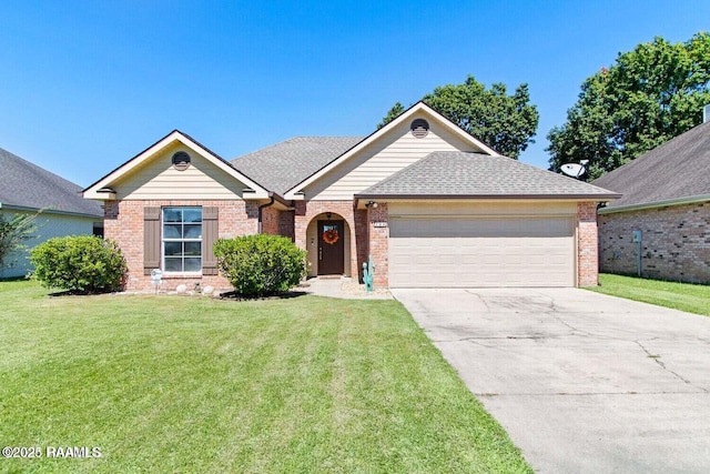 view of front of home featuring a garage and a front lawn