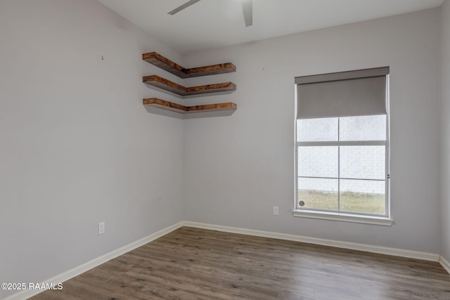 unfurnished room featuring hardwood / wood-style flooring and ceiling fan