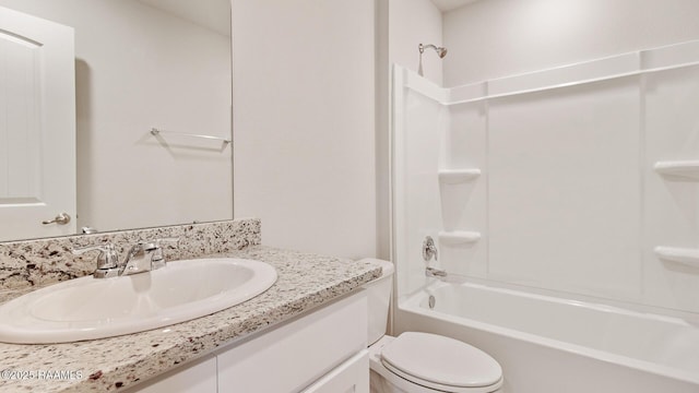 full bathroom featuring vanity, toilet, and shower / bath combination