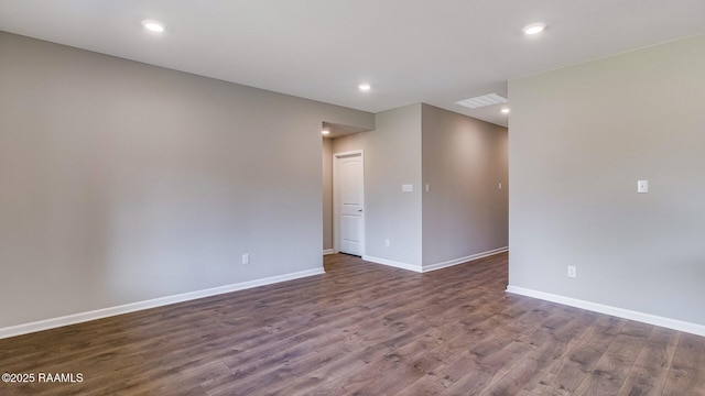 empty room featuring dark hardwood / wood-style floors