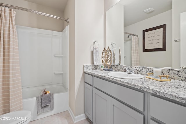 bathroom featuring vanity, tile patterned flooring, toilet, and shower / tub combo with curtain