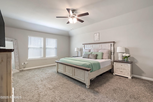 bedroom with a ceiling fan, carpet, lofted ceiling, and baseboards