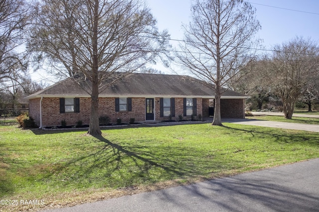 ranch-style home featuring a front yard