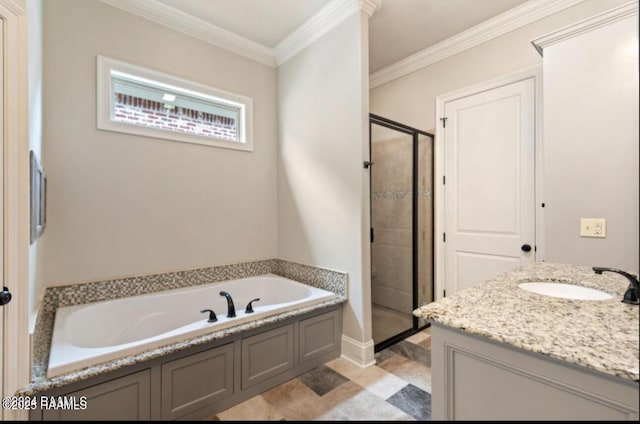 full bathroom featuring vanity, a bath, a shower stall, and crown molding