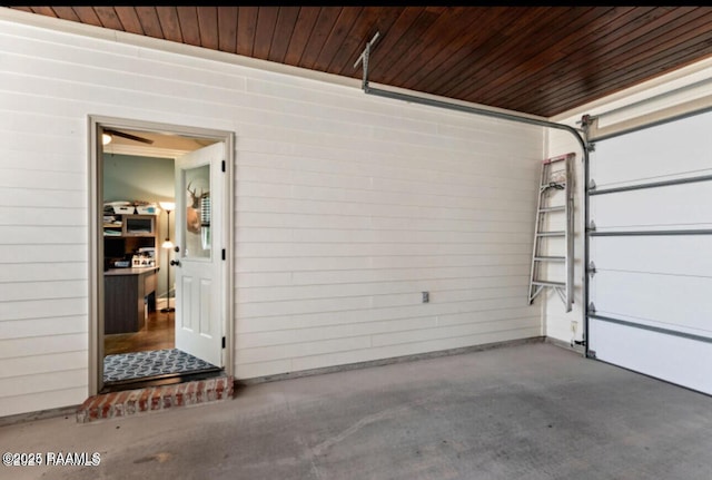 garage featuring wooden ceiling