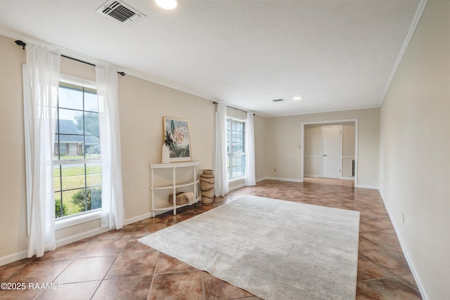 tiled empty room with crown molding