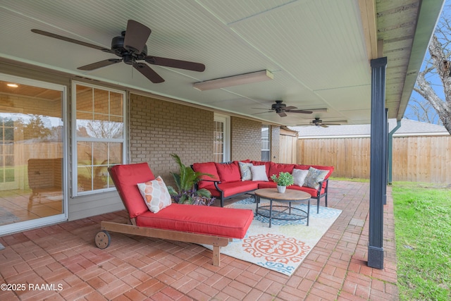 view of patio / terrace with an outdoor hangout area and ceiling fan