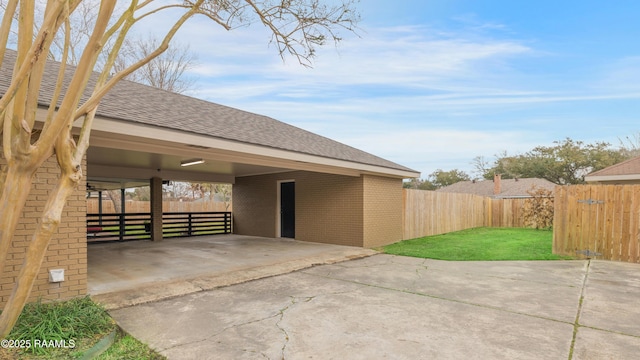 exterior space featuring a carport