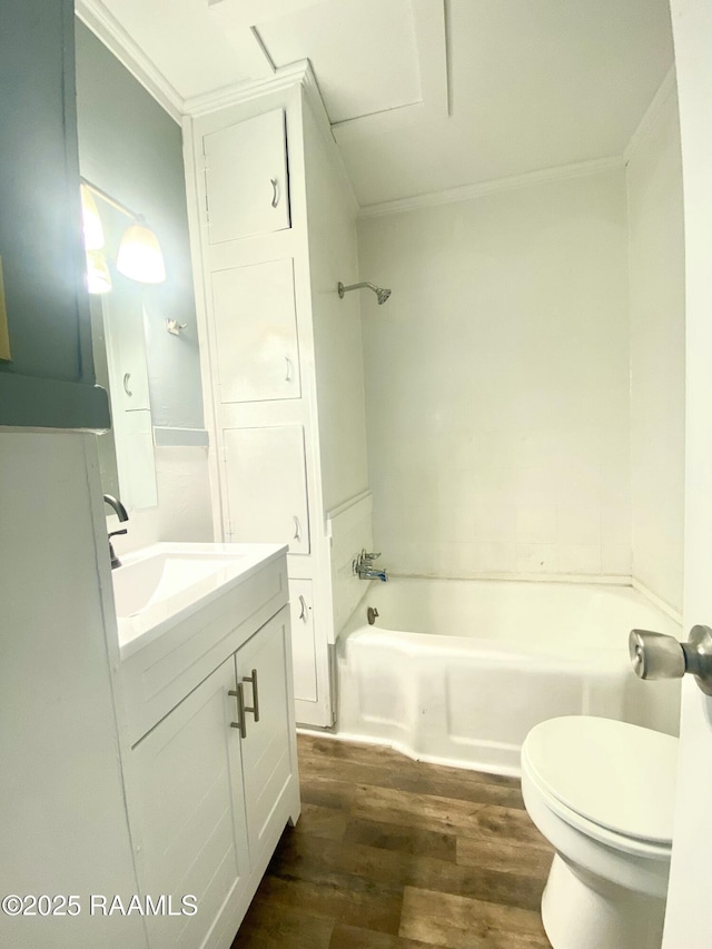 full bathroom featuring shower / tub combination, hardwood / wood-style flooring, vanity, toilet, and crown molding