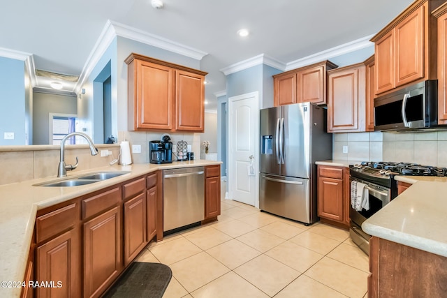 kitchen with tasteful backsplash, stainless steel appliances, sink, and light tile patterned floors