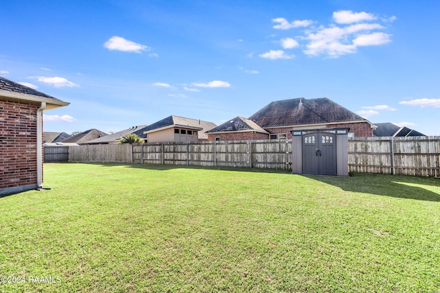 view of yard with a storage shed