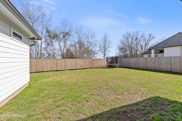 view of yard featuring a trampoline