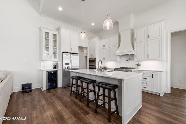 kitchen with wine cooler, white cabinetry, and stainless steel appliances