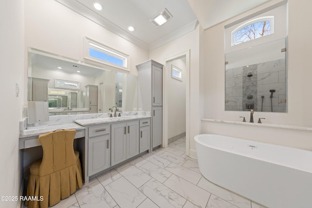 bathroom featuring vanity, crown molding, plenty of natural light, and shower with separate bathtub