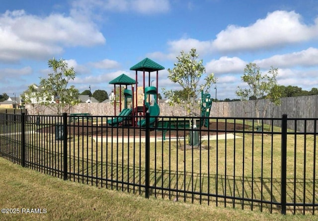 view of playground featuring a lawn