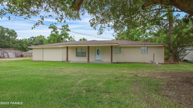 6903 W Congress, Duson, LA 70529 - view of front of property with a front lawn and brick siding