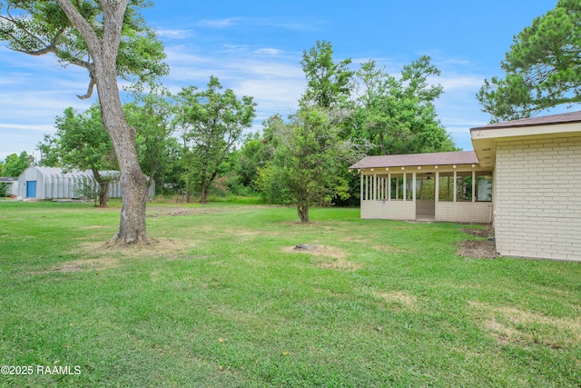 6903 W Congress, Duson, LA 70529 - view of grassy yard with a sunroom