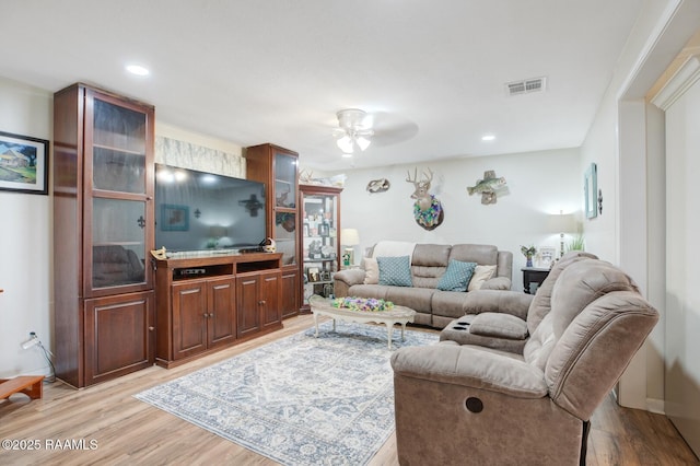 6903 W Congress, Duson, LA 70529 - living room with ceiling fan, light wood finished floors, and recessed lighting