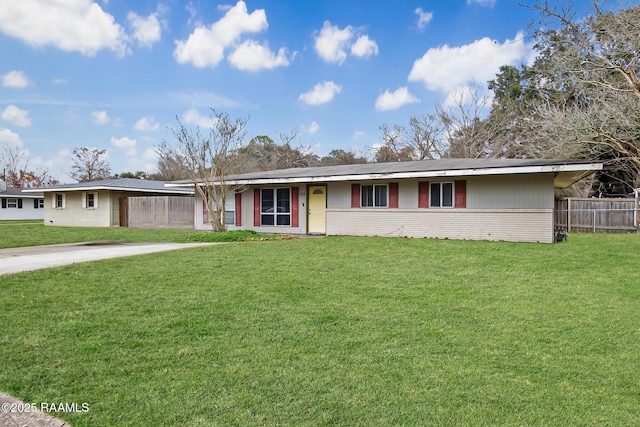 single story home with a front yard