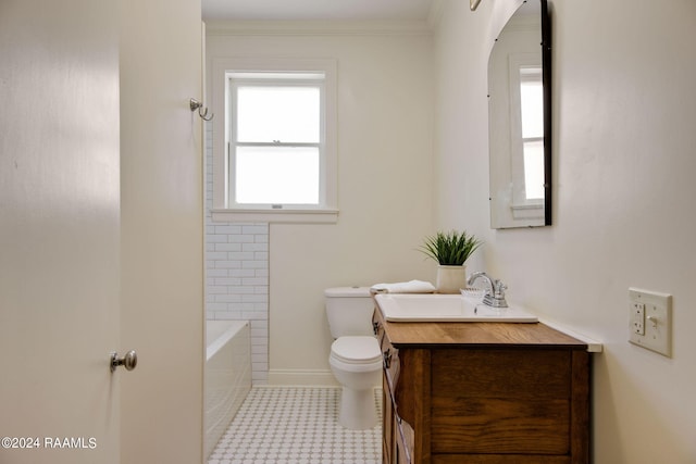 bathroom with vanity, plenty of natural light, ornamental molding, and toilet