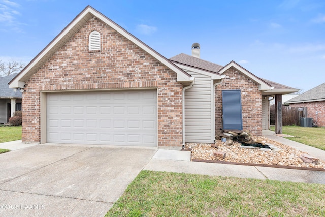 ranch-style home featuring brick siding, roof with shingles, a chimney, concrete driveway, and a garage