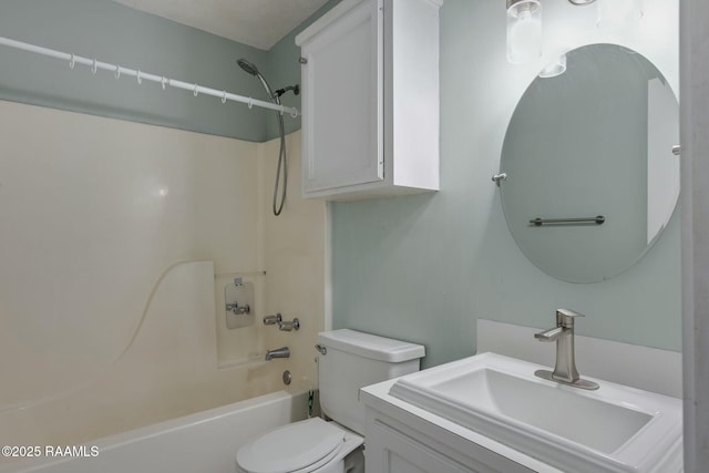 full bathroom featuring vanity, tub / shower combination, and toilet