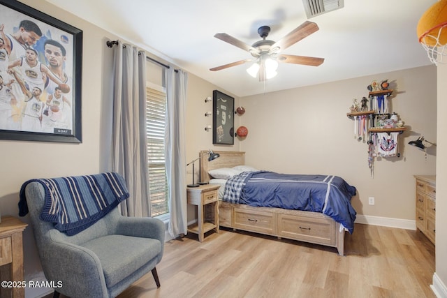 bedroom featuring light hardwood / wood-style flooring and ceiling fan