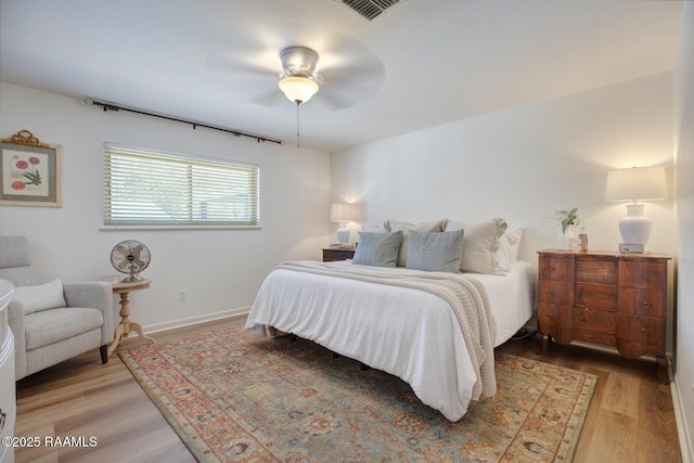 bedroom featuring ceiling fan and light wood-type flooring