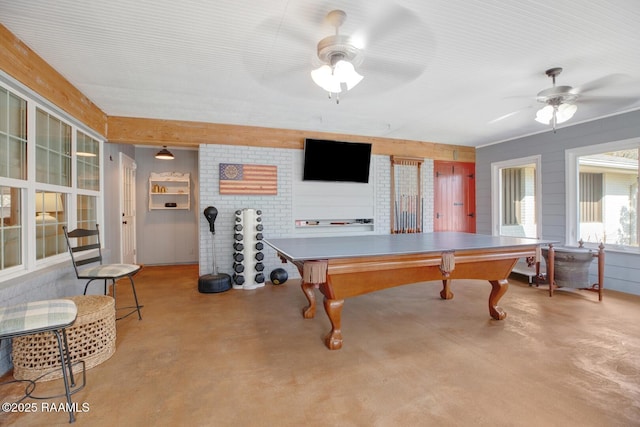 rec room with concrete flooring, ceiling fan, and billiards