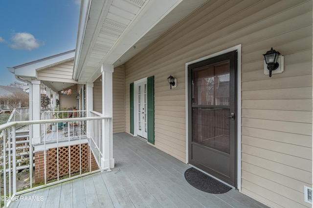 wooden deck with a porch