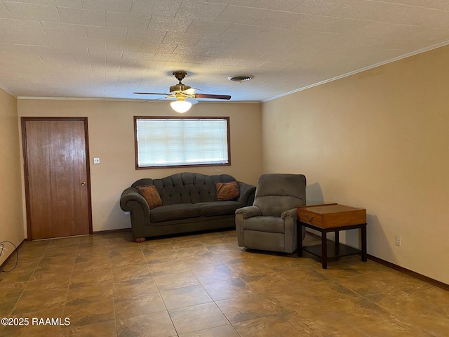 living room featuring crown molding and ceiling fan