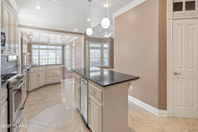 kitchen featuring stainless steel appliances, ornamental molding, hanging light fixtures, and a center island