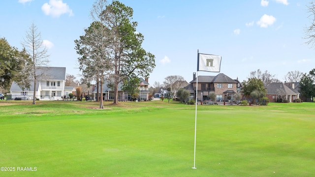 view of community featuring a lawn