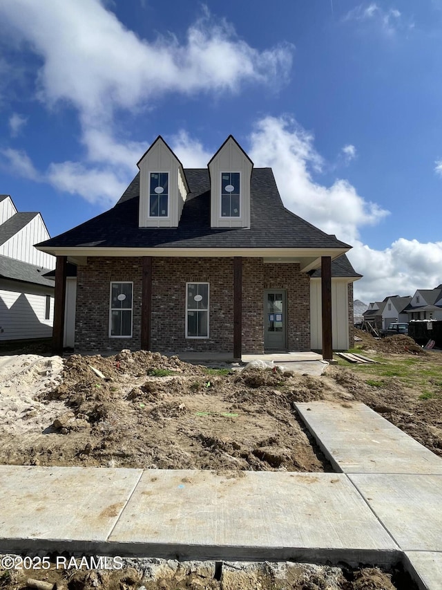 view of front of home featuring covered porch