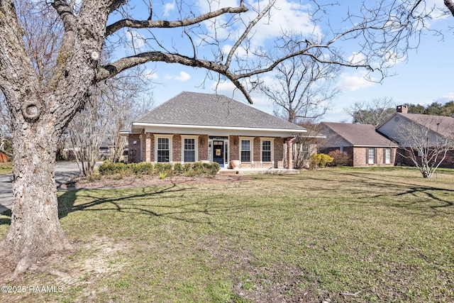 view of front of house with a porch and a front lawn