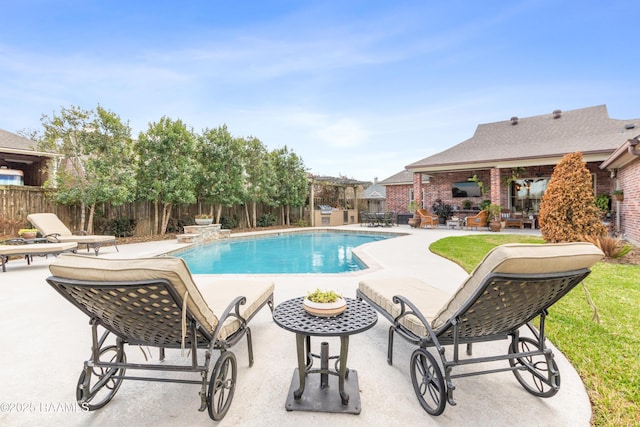 view of swimming pool with a patio